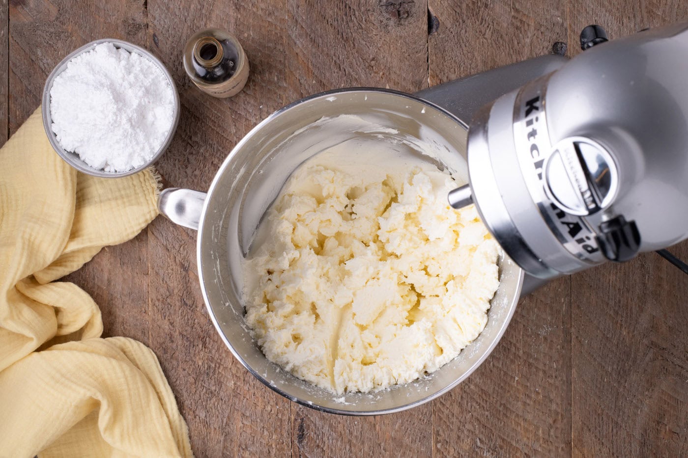cream cheese and butter beaten in a bowl of a mixer