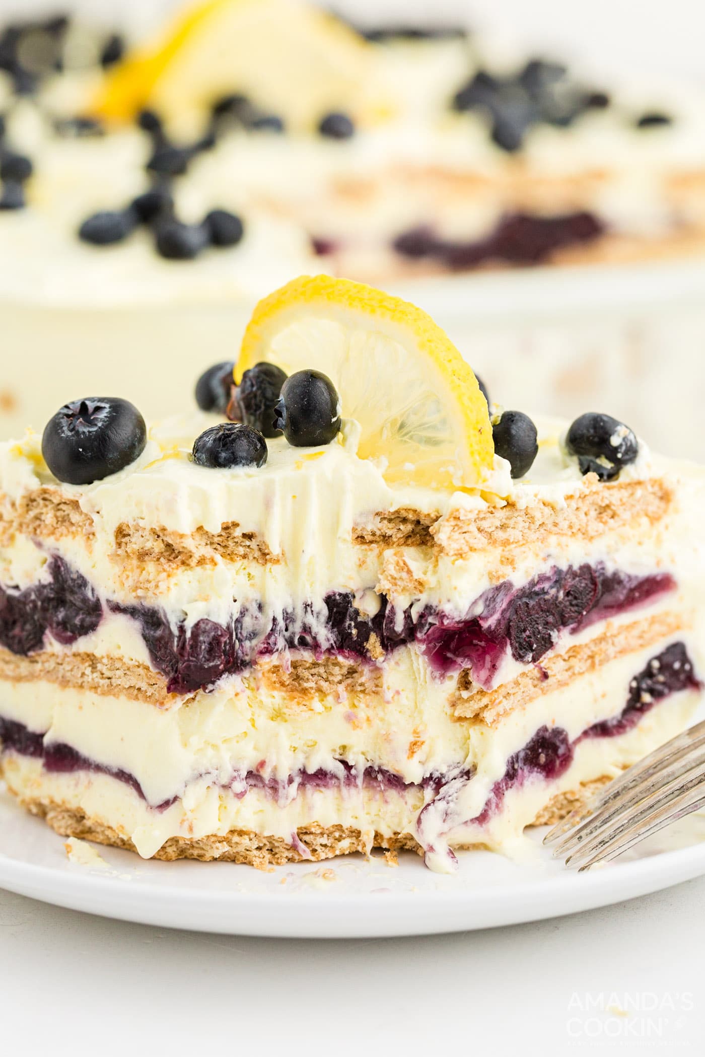 Lemon Blueberry Icebox Cake with a bite out of it