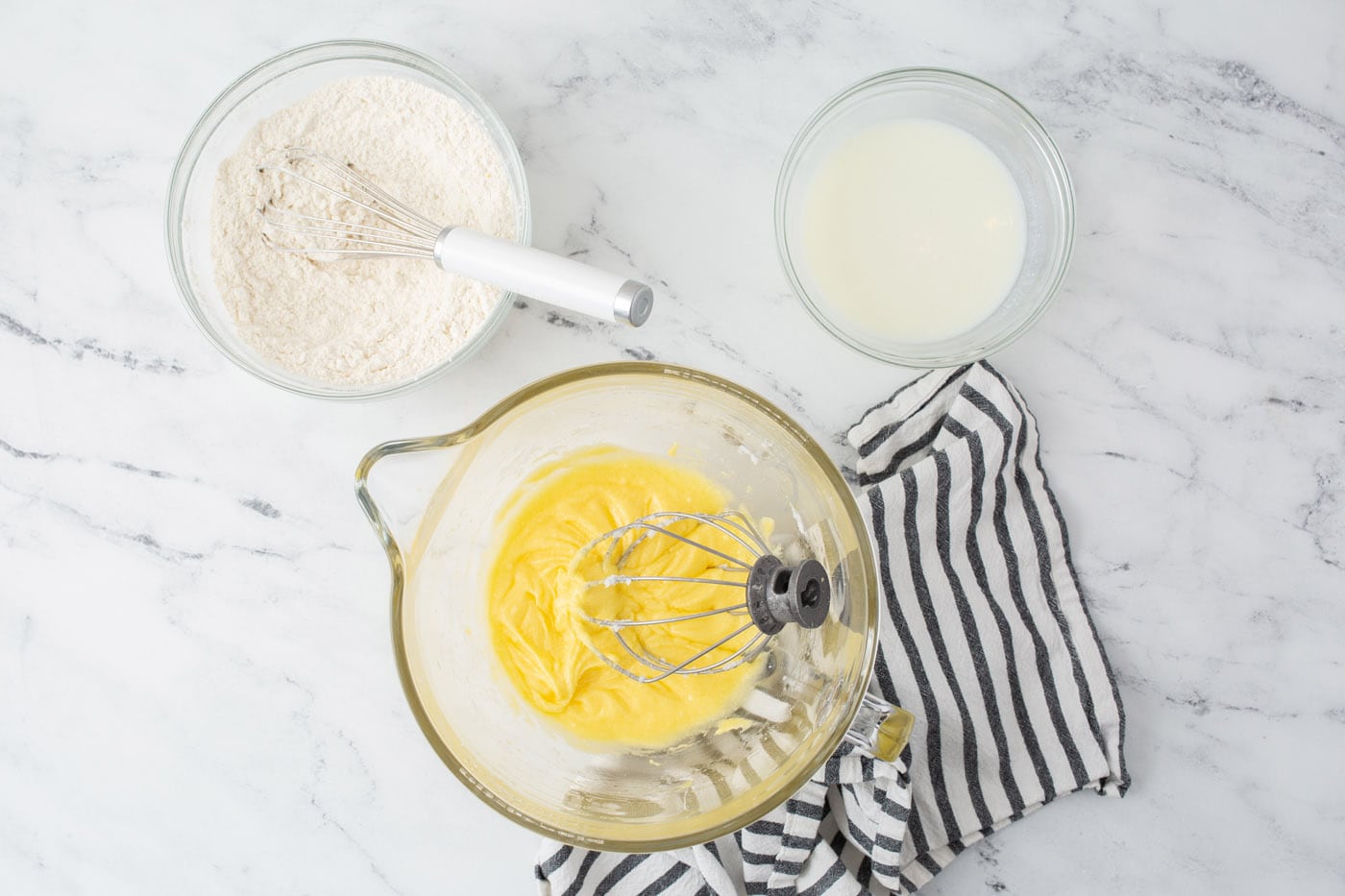 ingredients for lemon cake in bowls