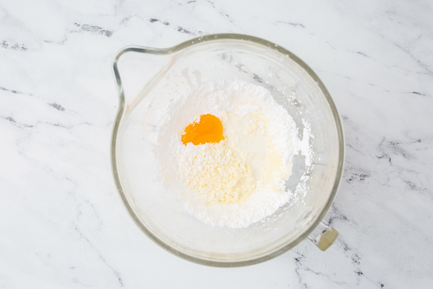 lemon frosting ingredients in a mixing bowl