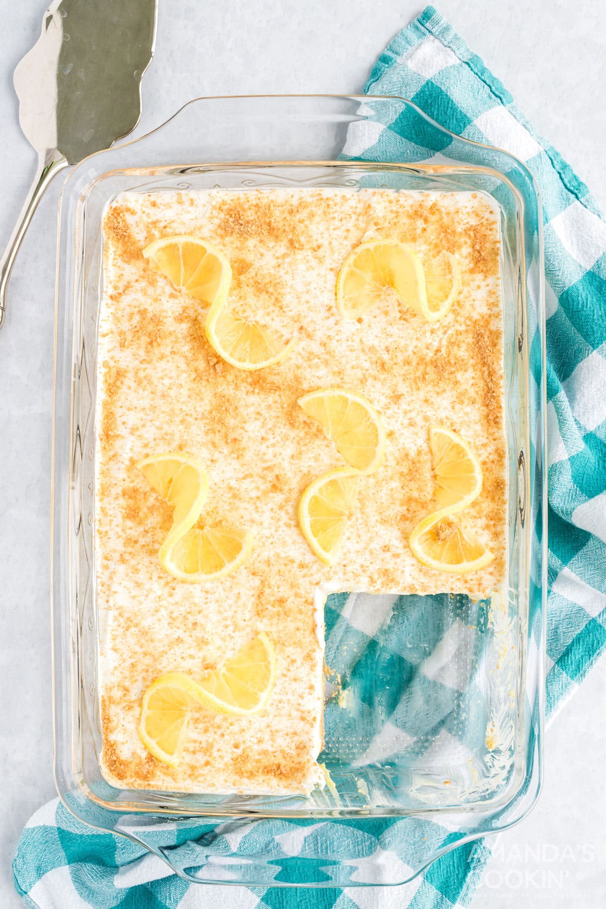 overhead view of dessert in pan garnished with lemons