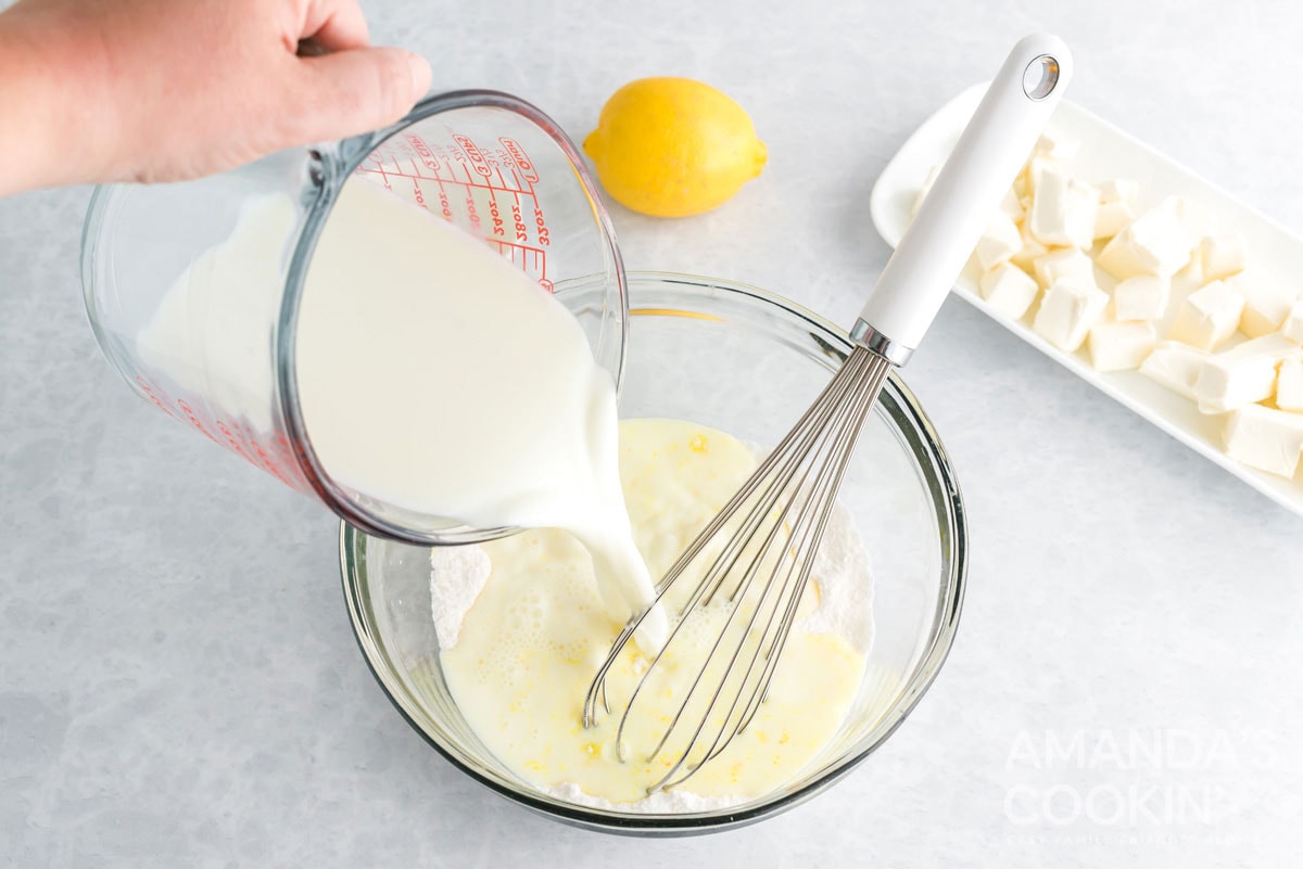 pouring milk into bowl