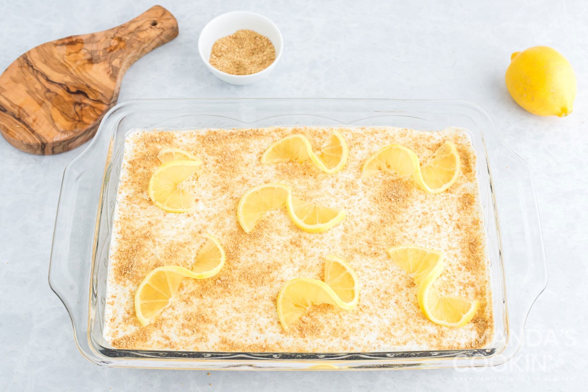 pan of dessert garnished with lemon