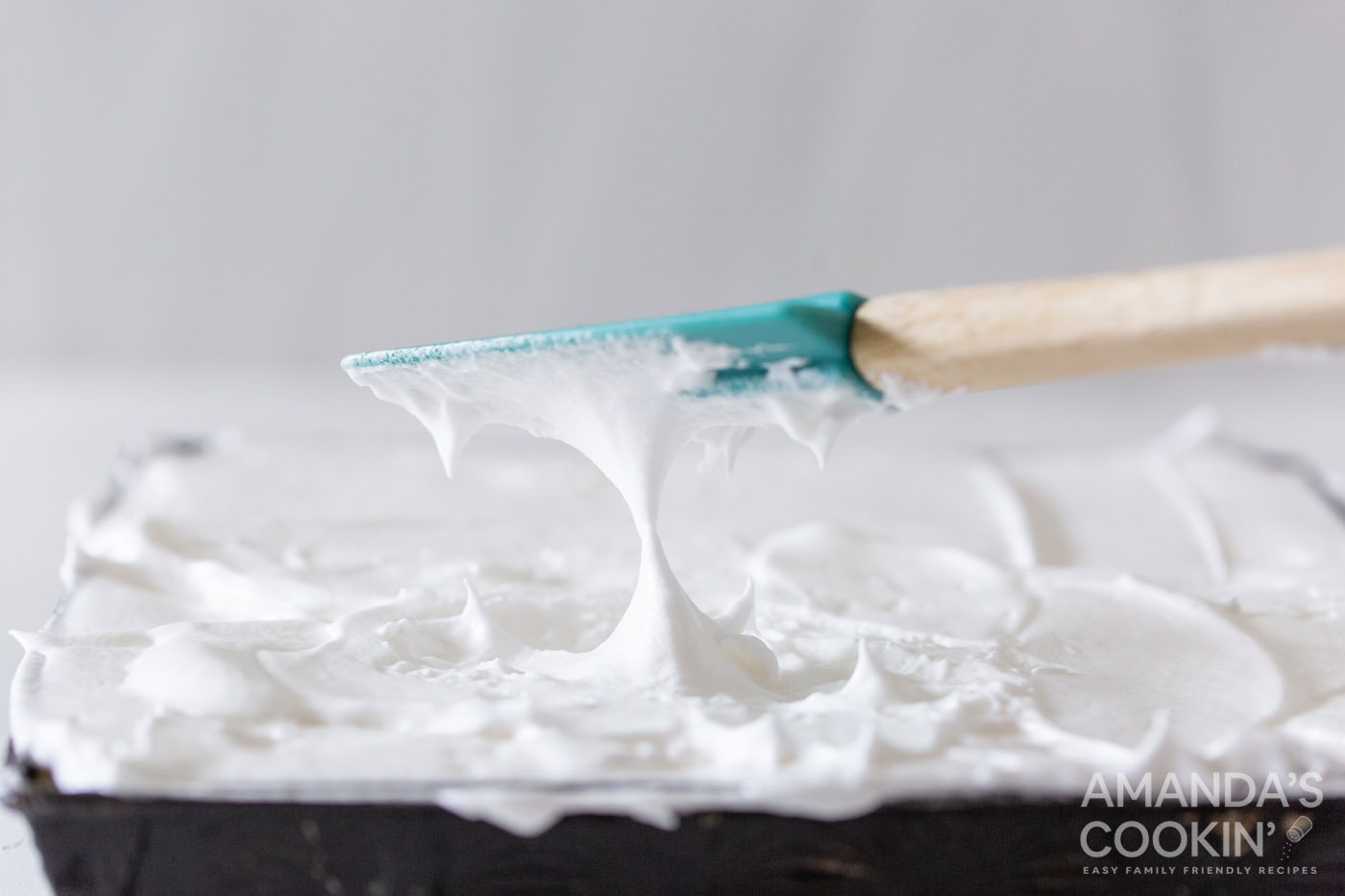 rubber spatula making lemon meringue peaks