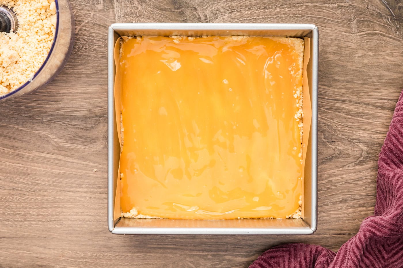 Lemon curd layer added over the crust