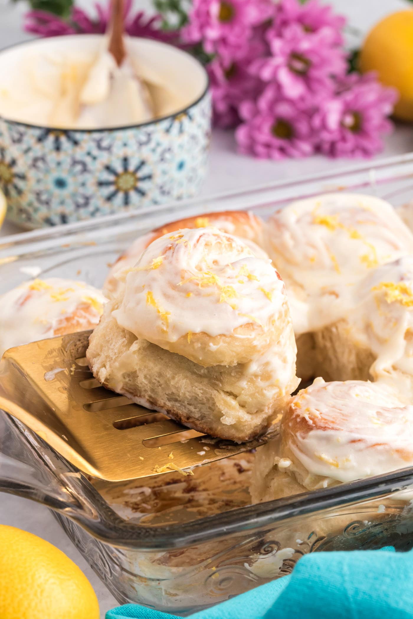 Lemon Sweet Roll being lifted from the pan