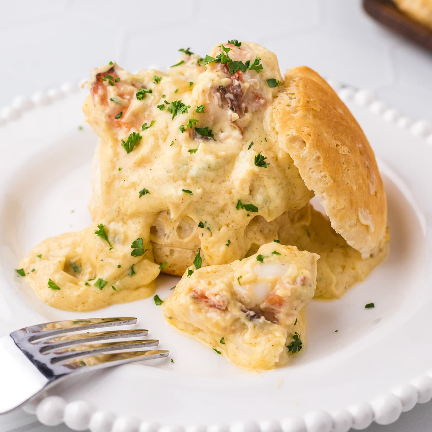 Plate of Lobster Newburg over an open biscuit