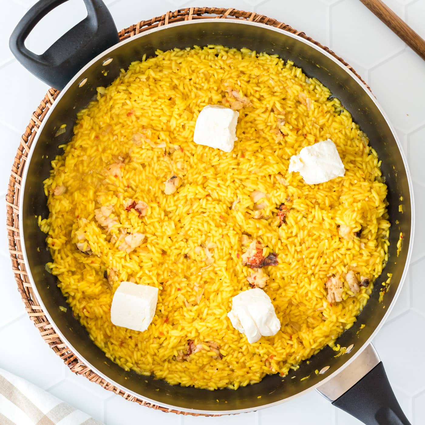 cream cheese on top of lobster risotto