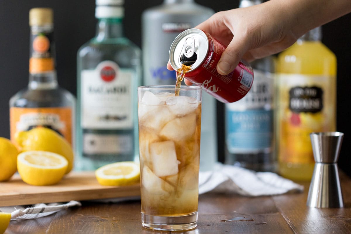 adding cola to a long island iced tea