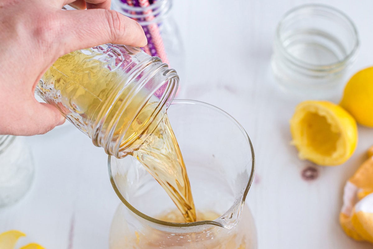 adding Jack Daniels whiskey to a pitcher