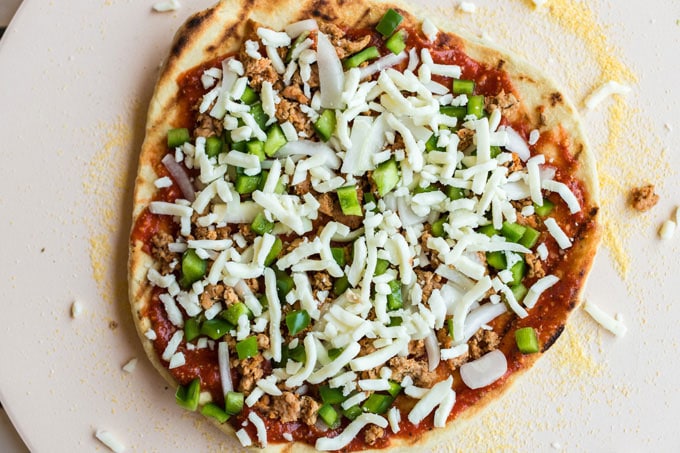 pizza ready to go on grill