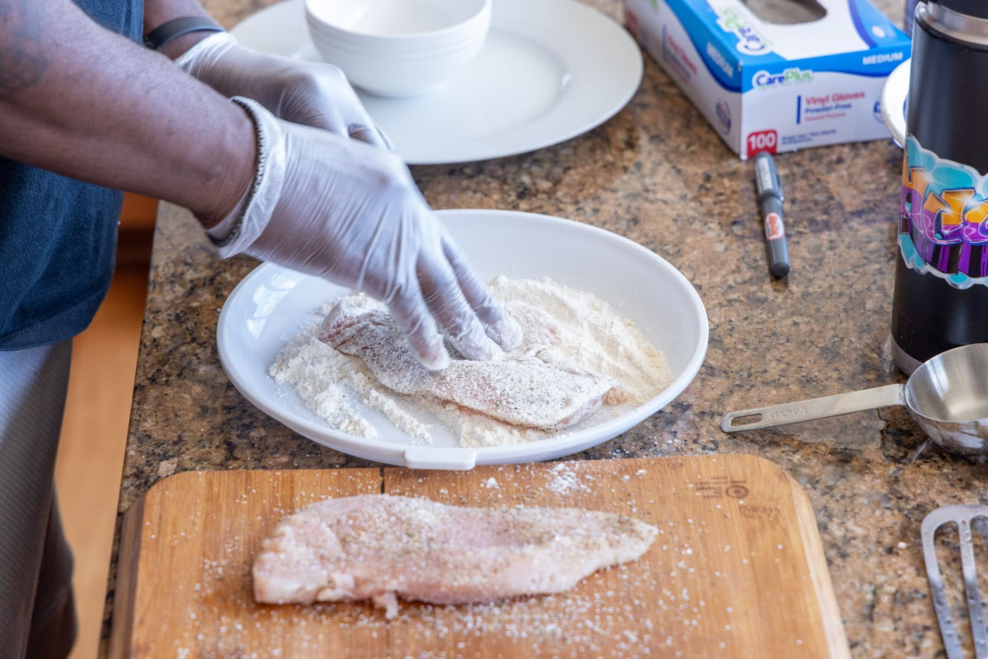 chicken breast covered in flour