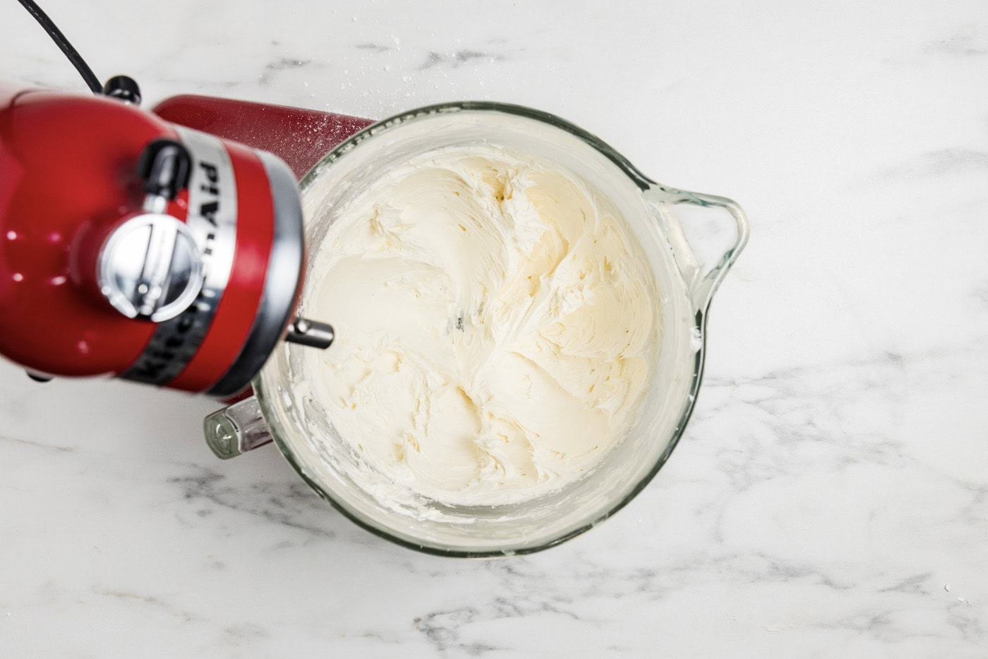 marshmallow fluff frosting in a stand mixer bowl
