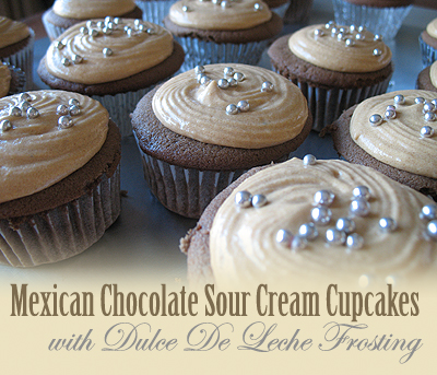 A close up photo of Mexican chocolate cupcakes with dulce de leche frosting.