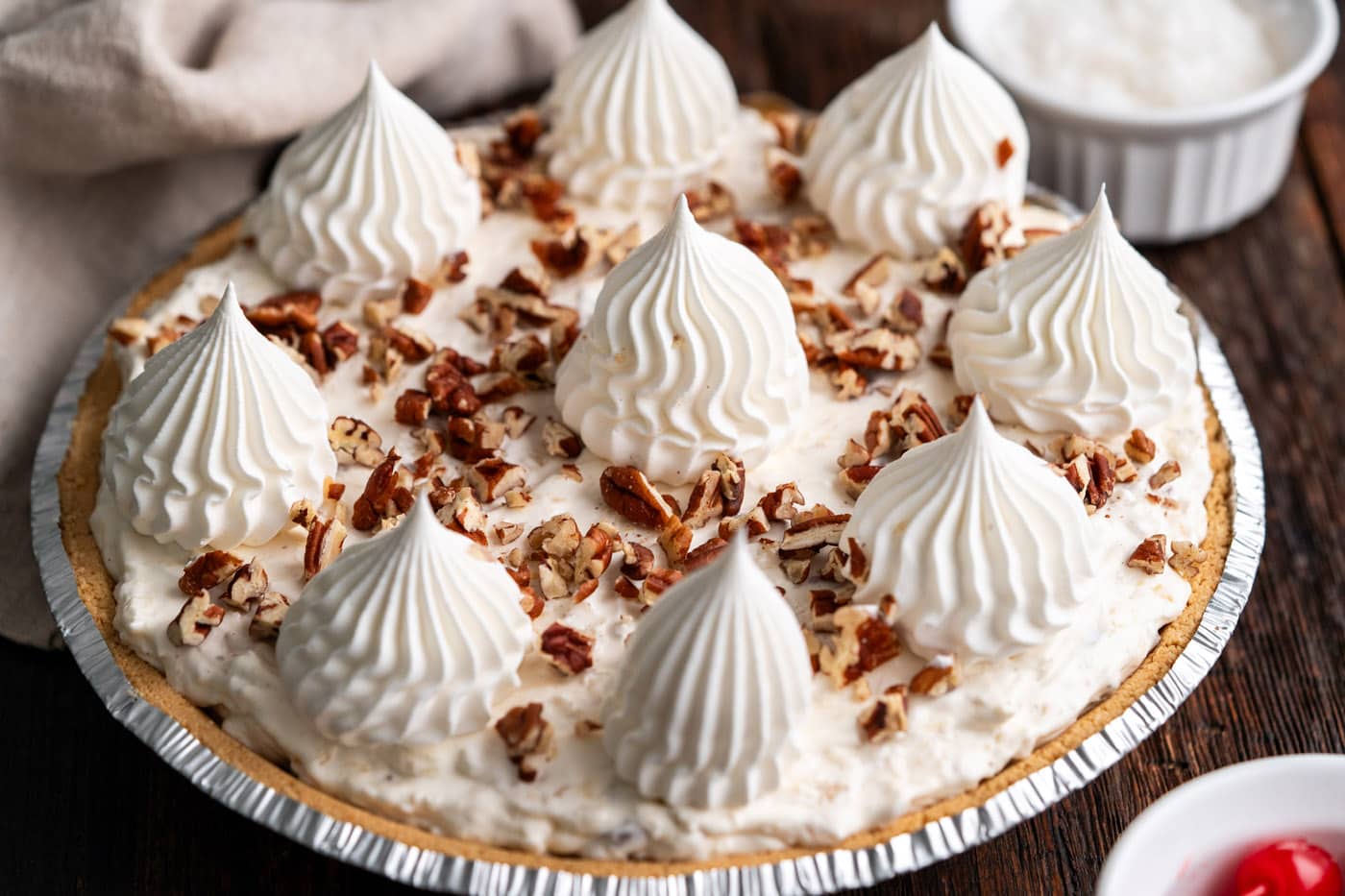 piped cool whip rosettes on top of pie