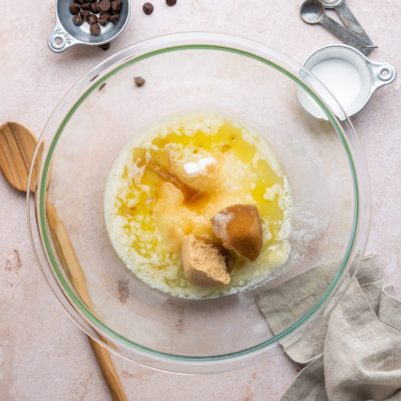 granulated sugar, brown sugar, oil, butter, and vanilla in a large bowl