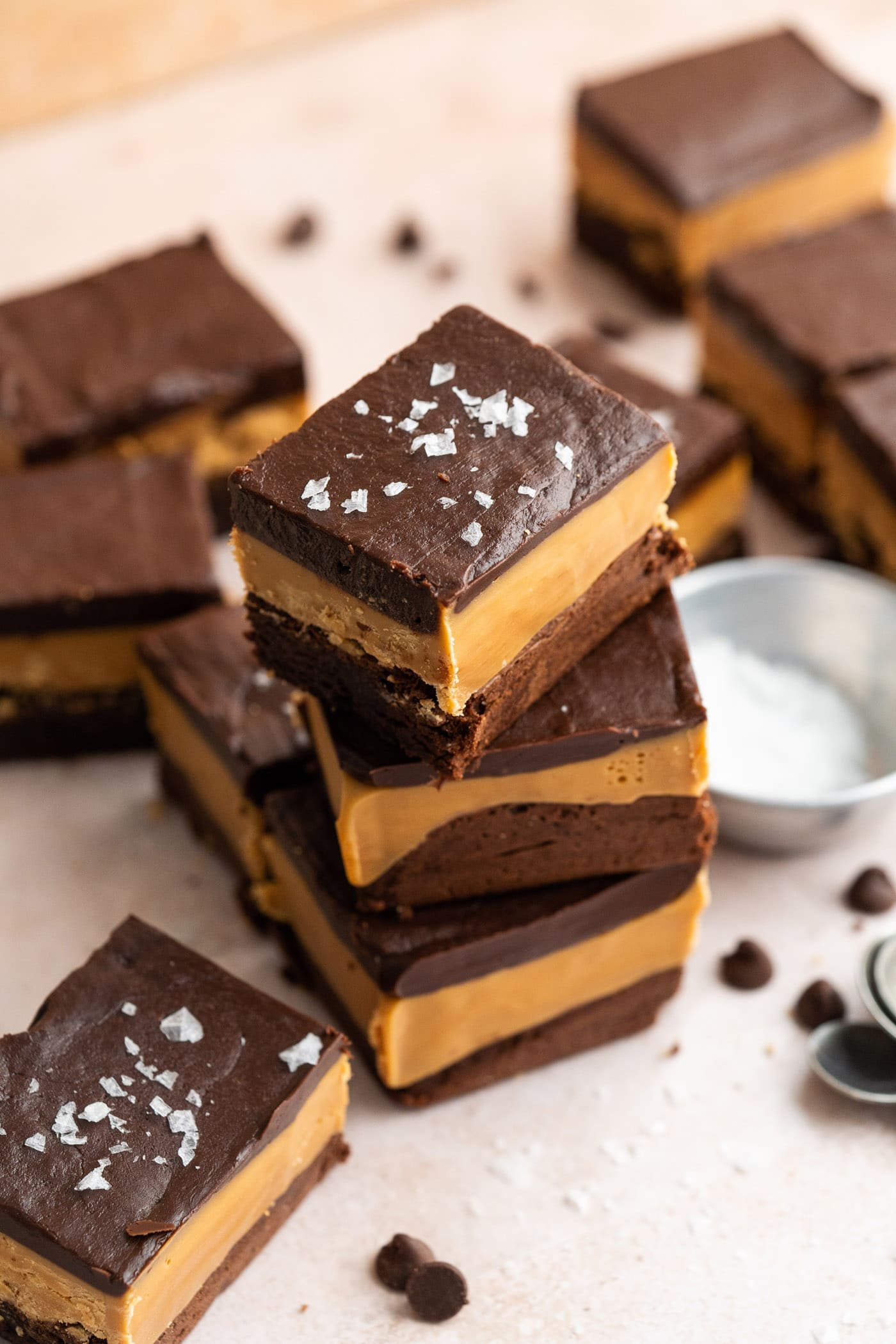 Stack of three Millionaire Brownies with others around it