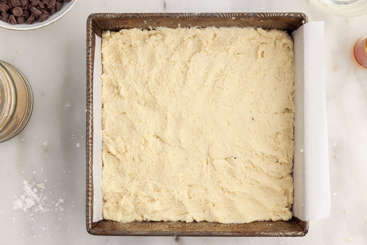 shortbread crust pressed onto bottom of a pan