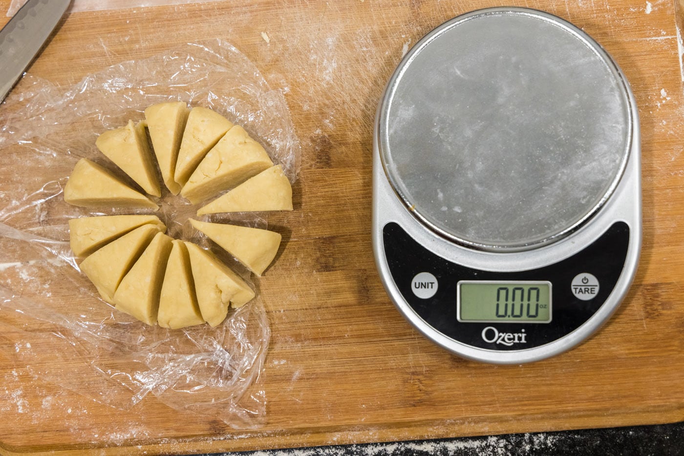 slicing dough into triangles