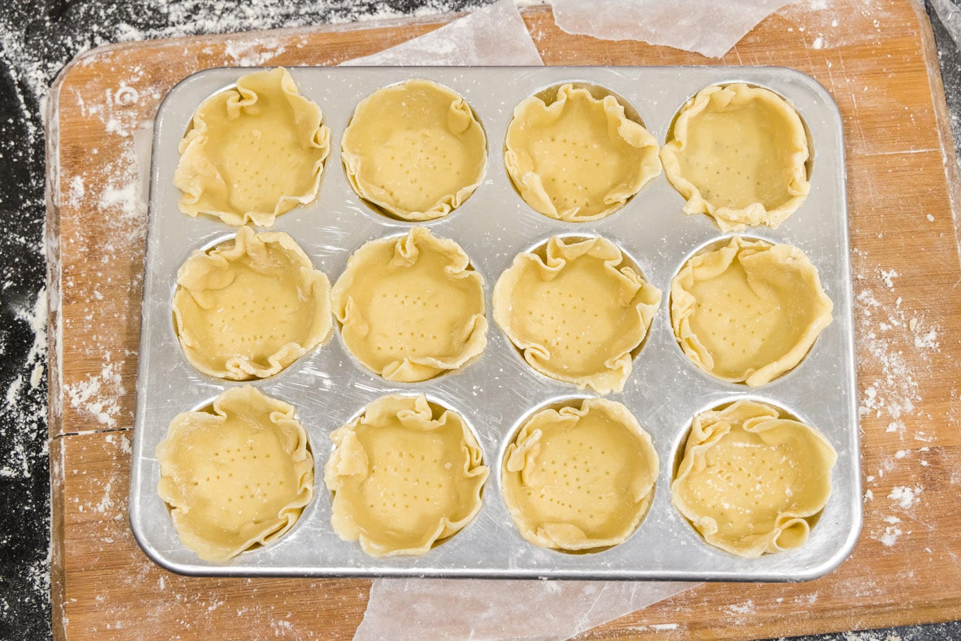 mini pie dough in muffin pan