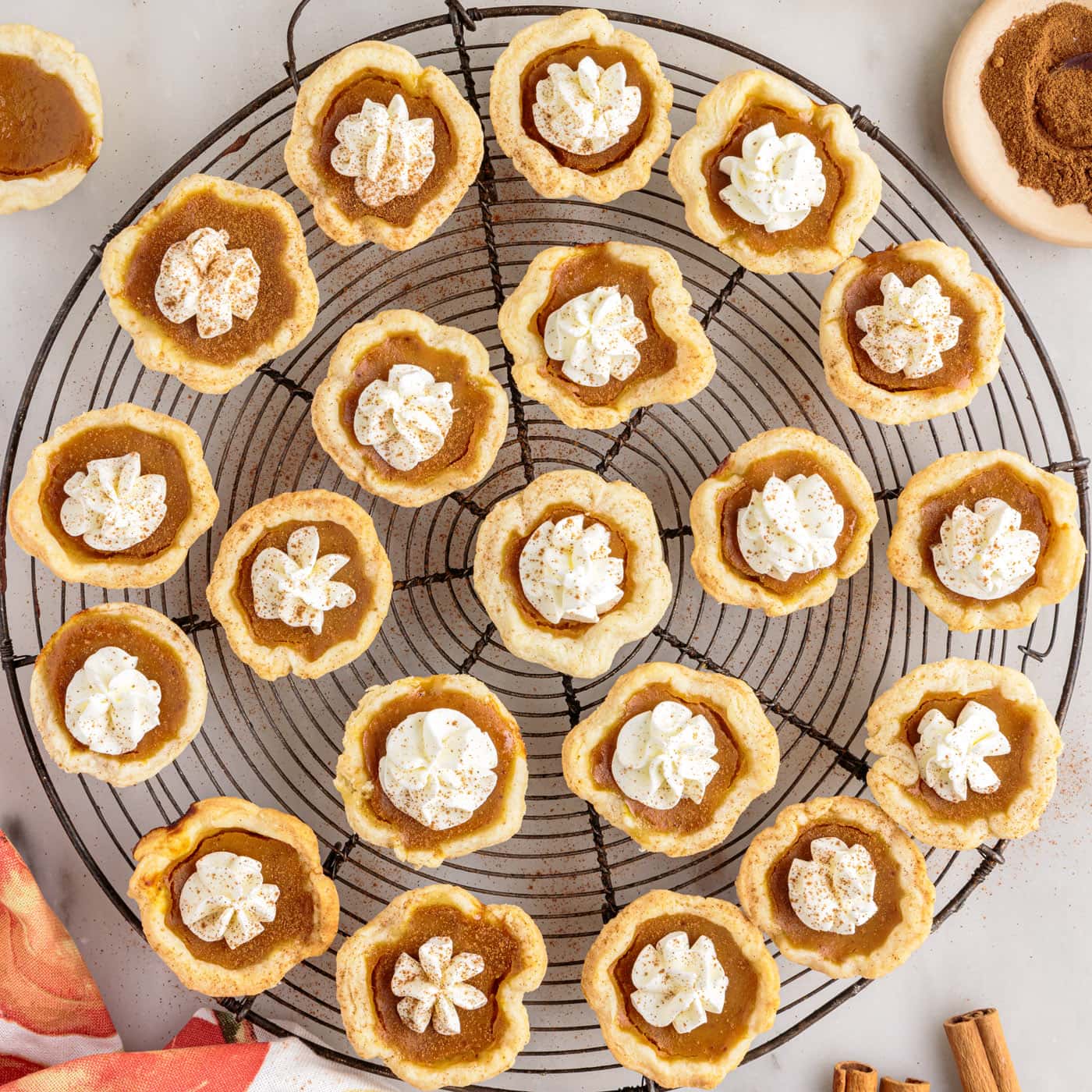 Mini Pumpkin Pies on a wire rack