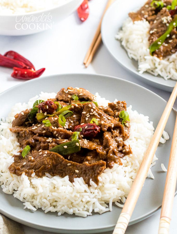 plate of Mongolian Beef with chop sticks