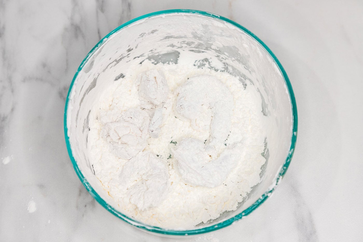 flour dredged shrimp in a bowl