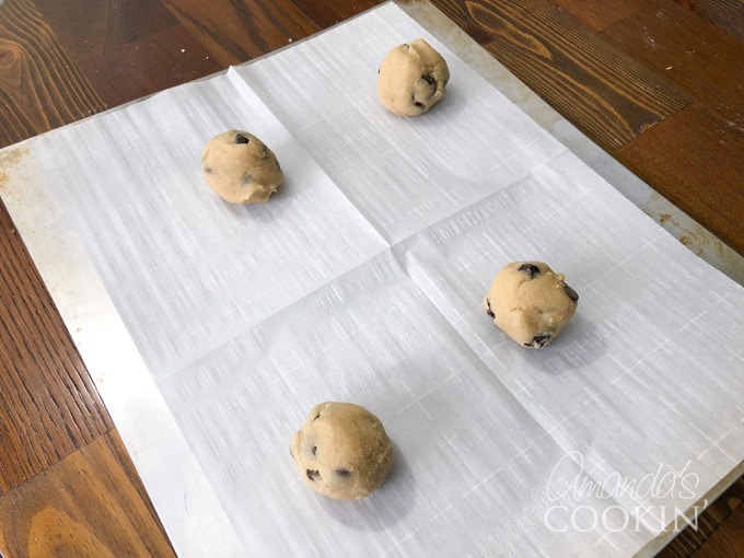 chocolate chip cookie dough on baking sheet