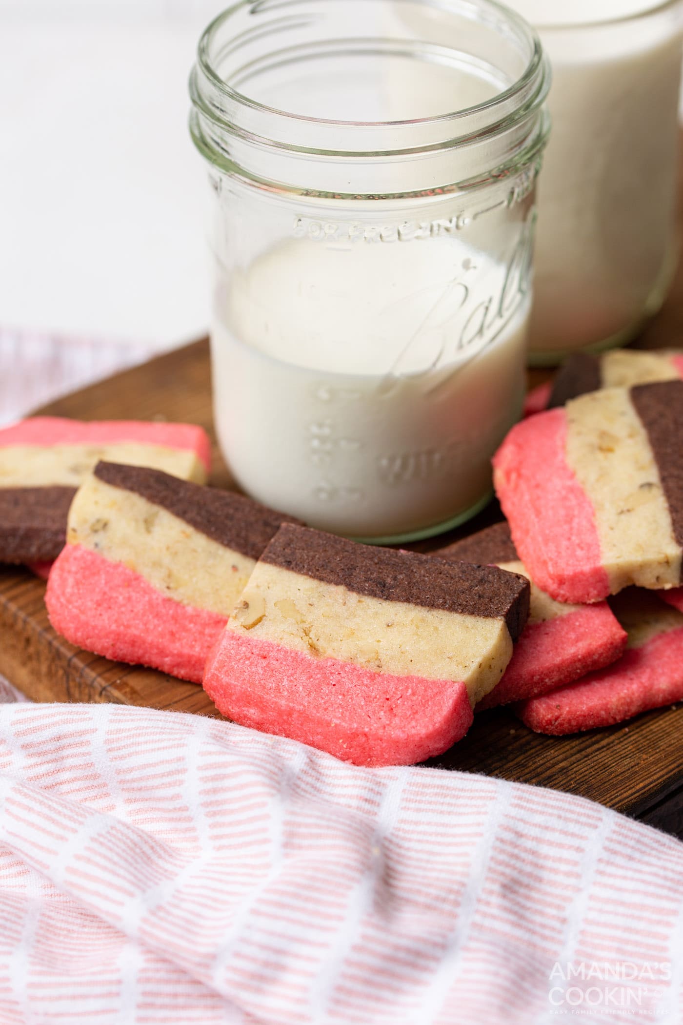 neapolitan cookies with glass of milk