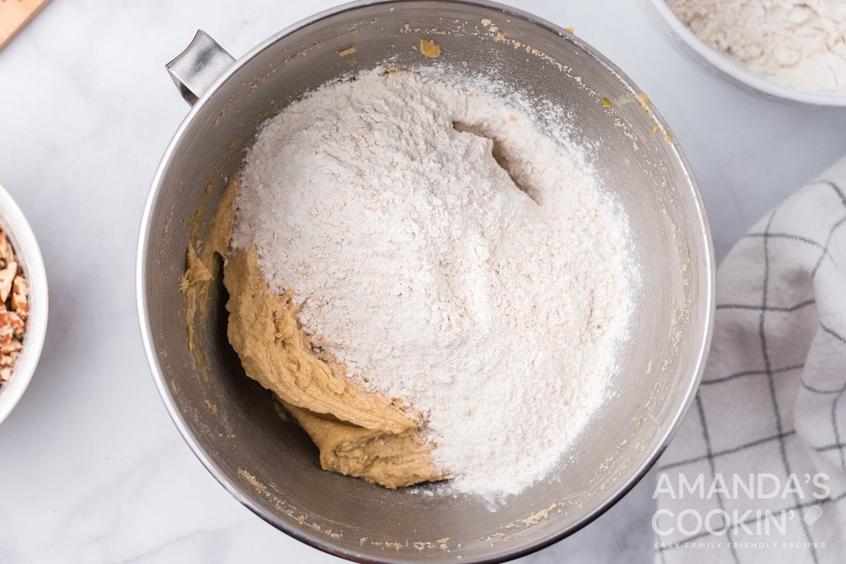 flour and cookie dough in bowl