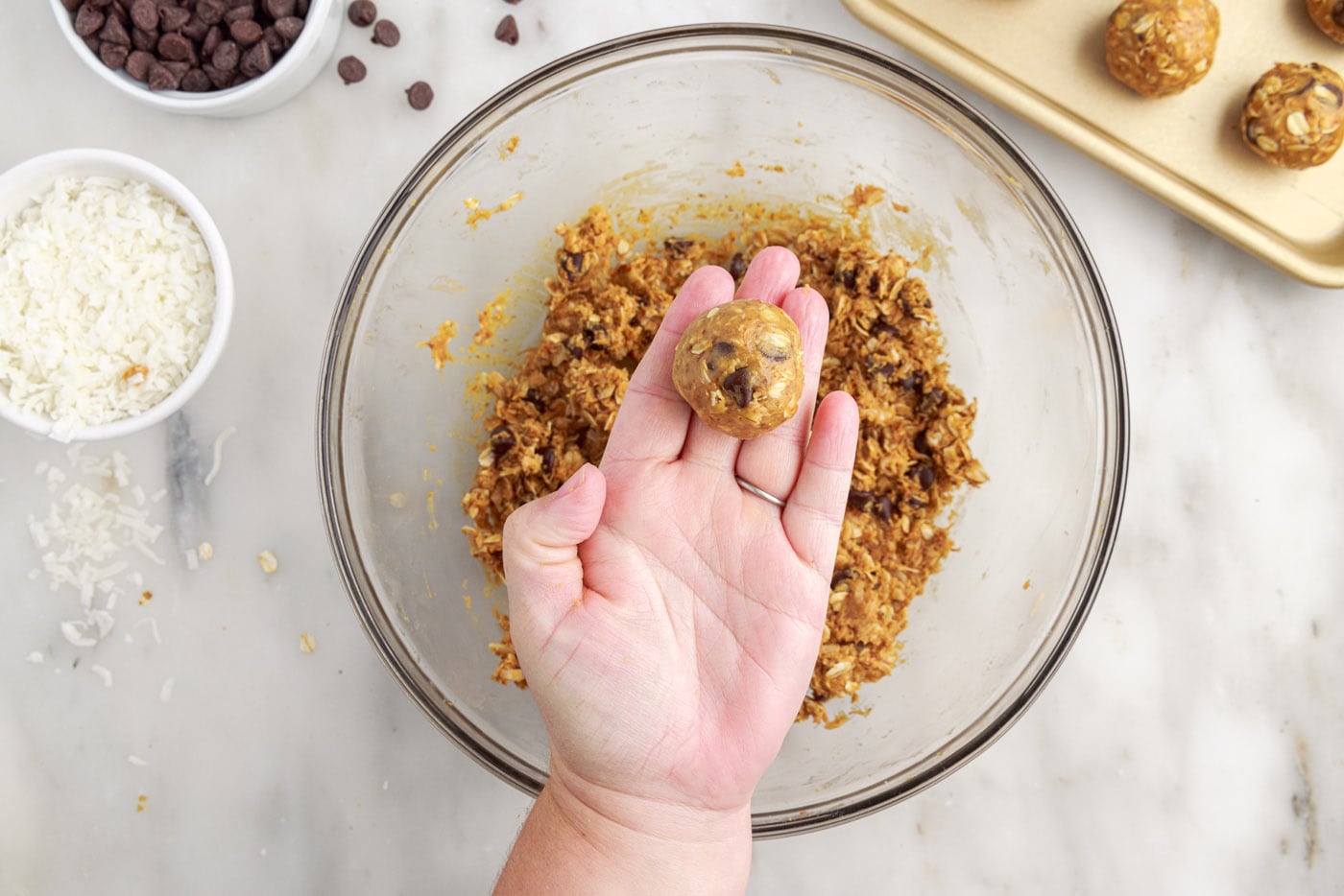 hand holding no bake energy ball