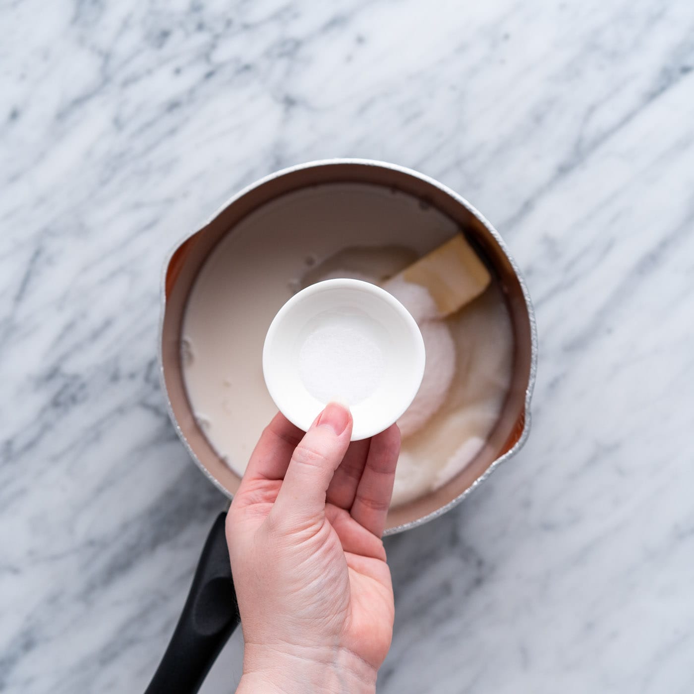 butter, sugar, salt, and milk in a saucepan