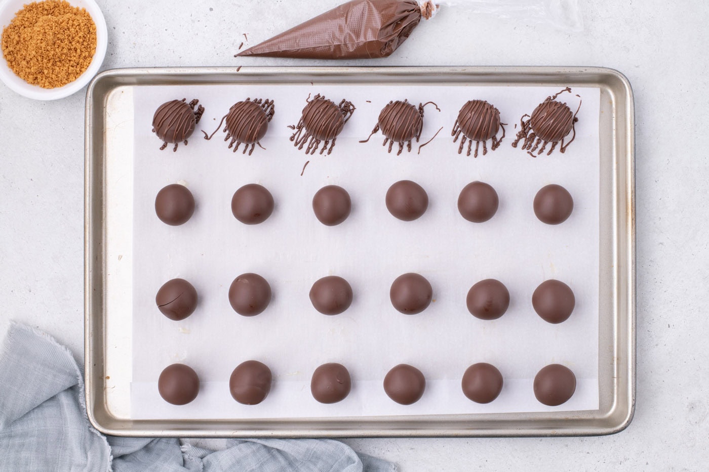 chocolate dipped nutter butter cookies with chocolate drizzle