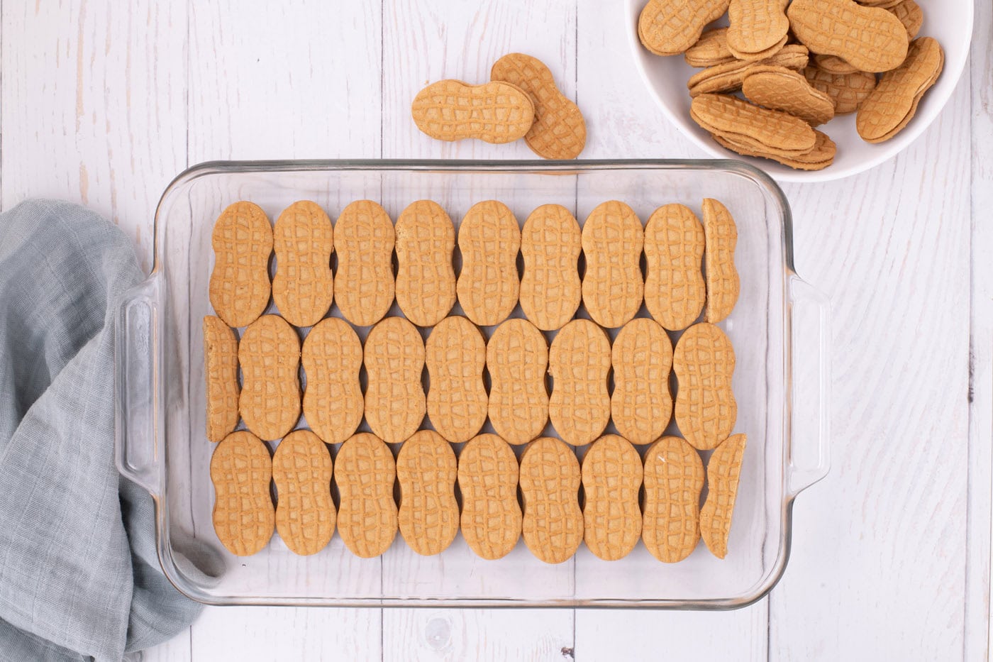 nutter butter cookies lined in a baking dish