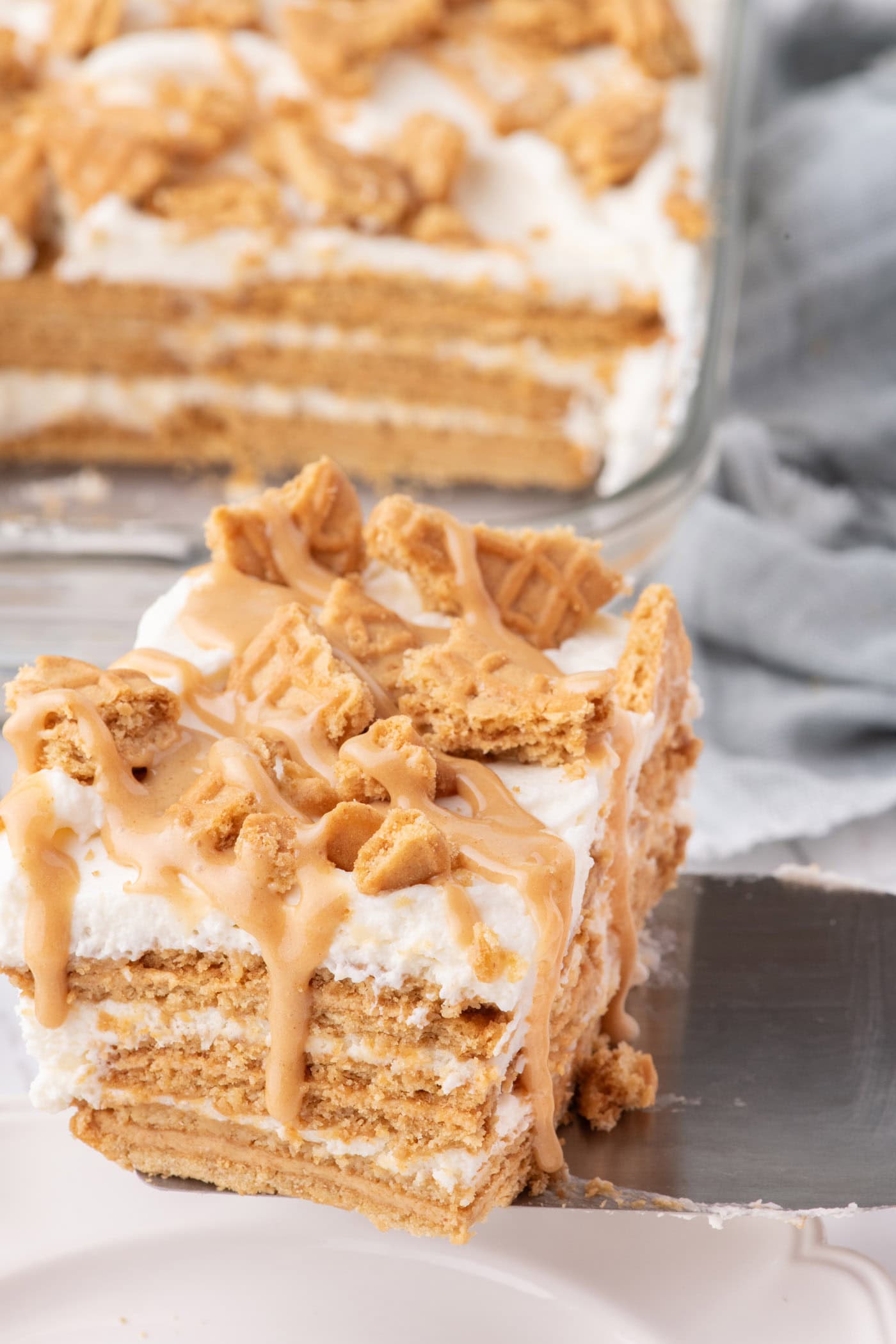 Slice of Nutter Butter Icebox Cake on a spatula