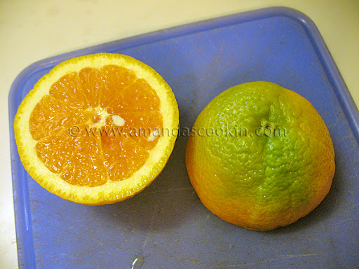A close up photo of an orange sliced in half.