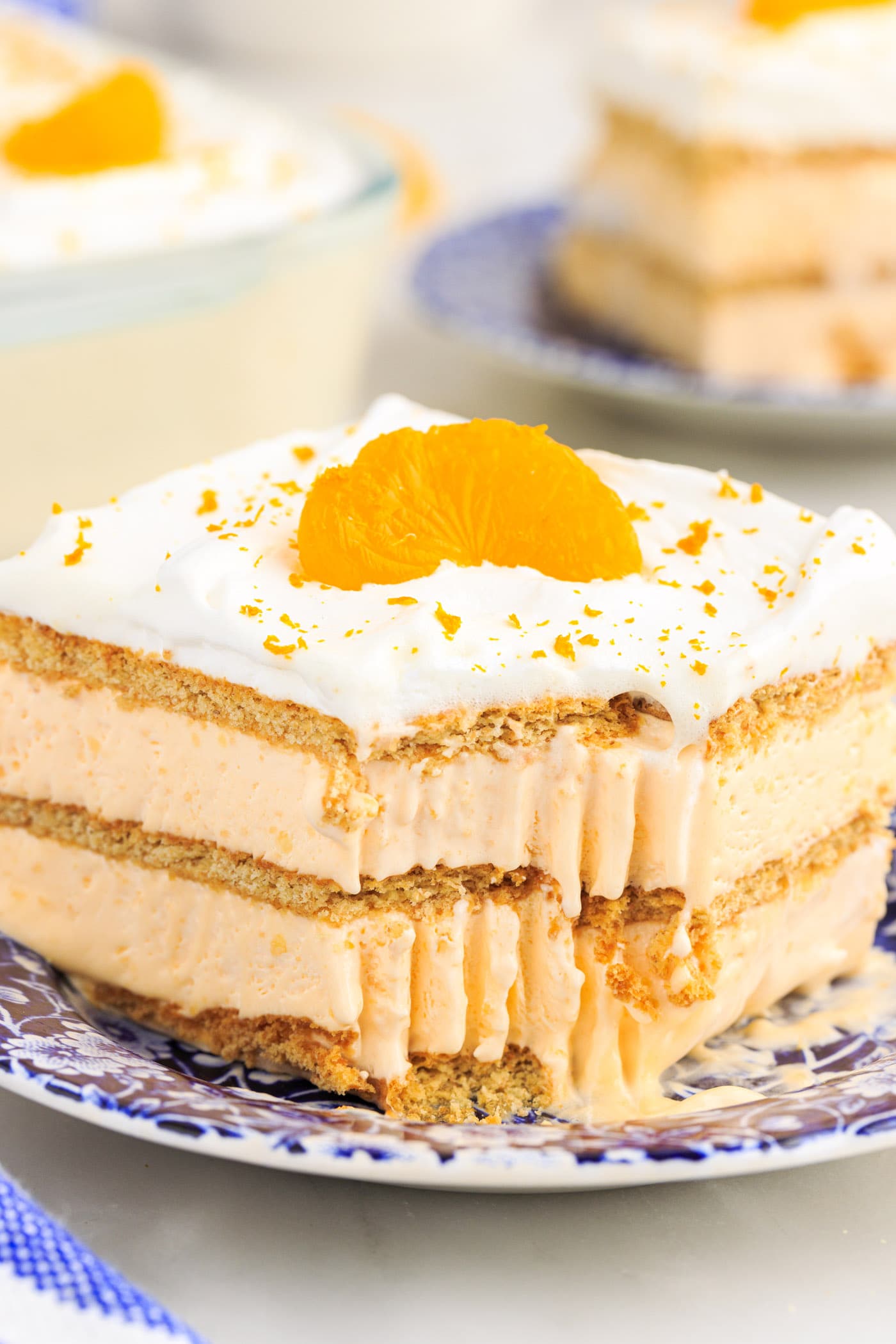 slice of Orange Icebox Cake with bite out of it