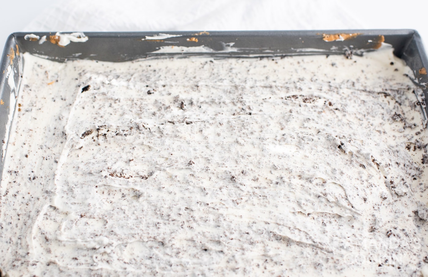 oreo cheesecake mixture in a pan