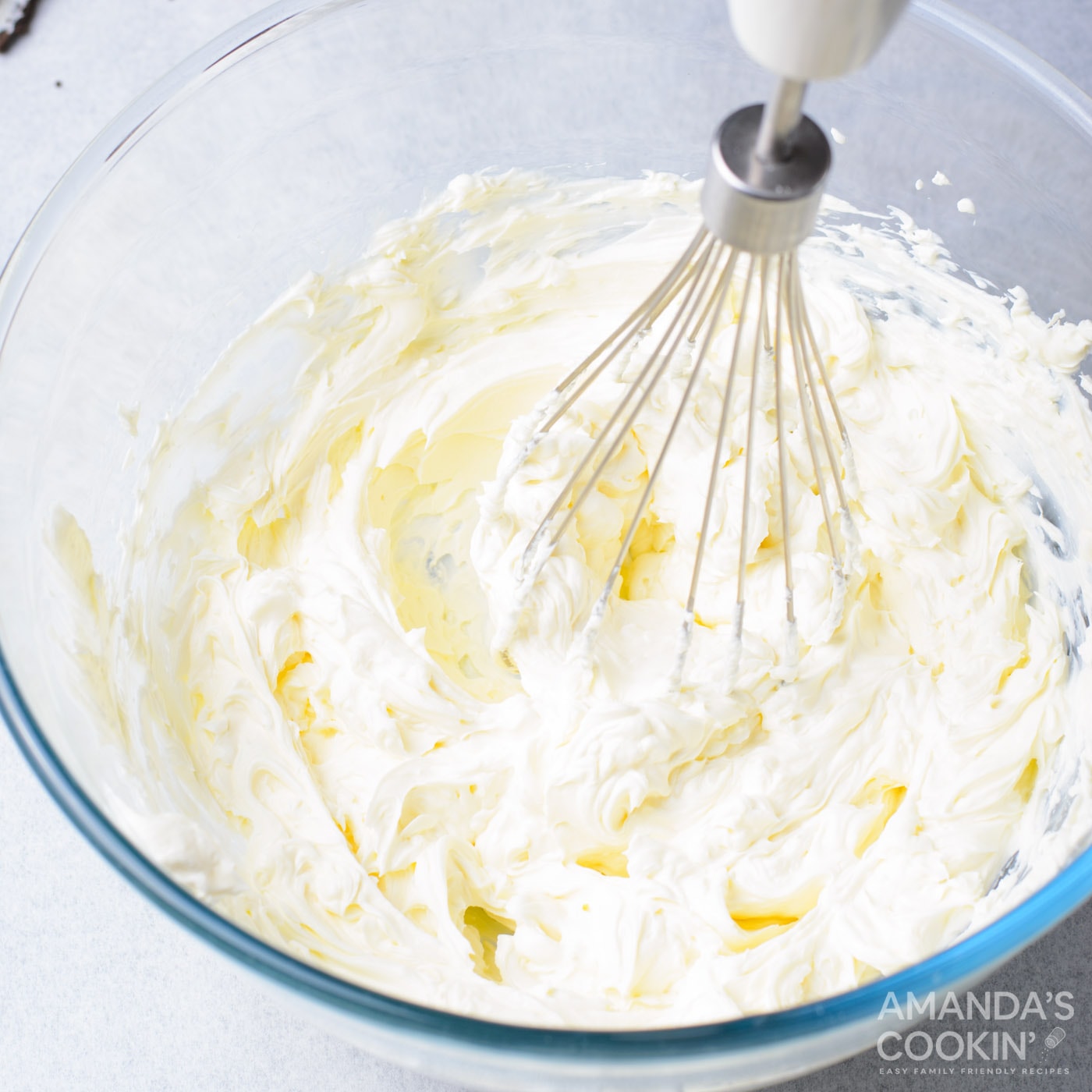 mixing cream cheese