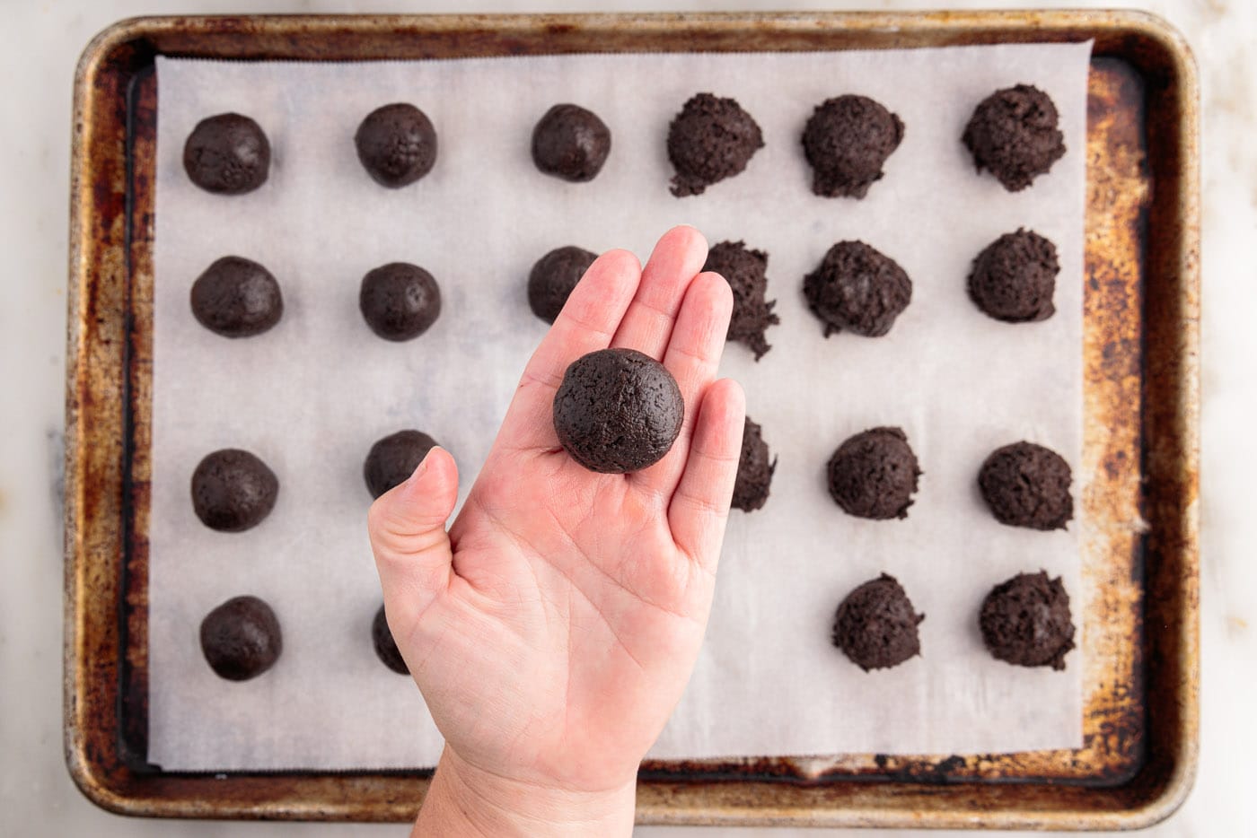 rolling oreo mixture into a ball