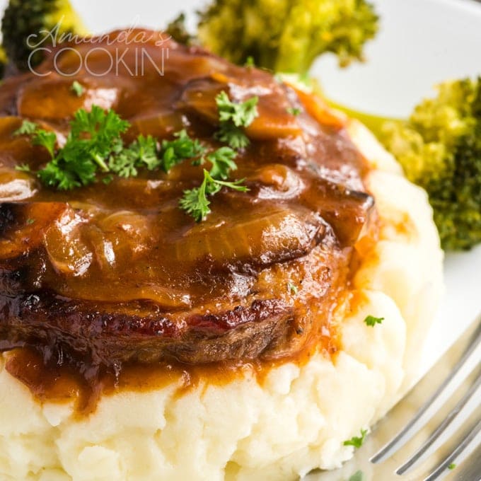 swiss steak on mashed potatoes