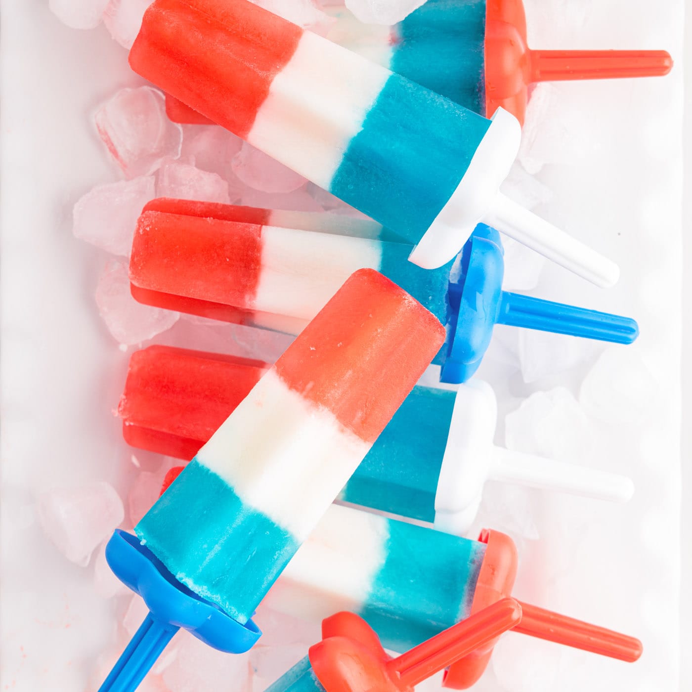 Patriotic Bomb Pops resting over ice