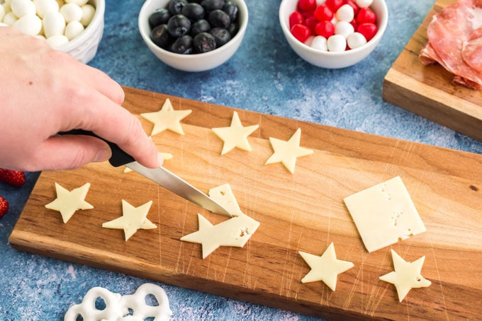 cutting cheese slices into star shapes