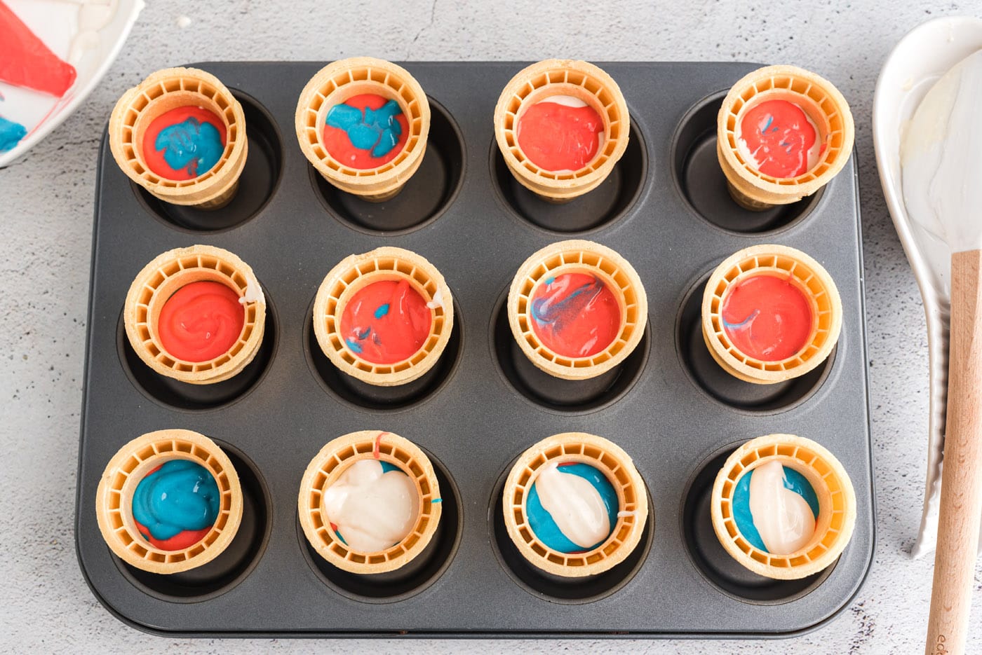 patriotic ice cream cone cupcakes in a cupcake pan