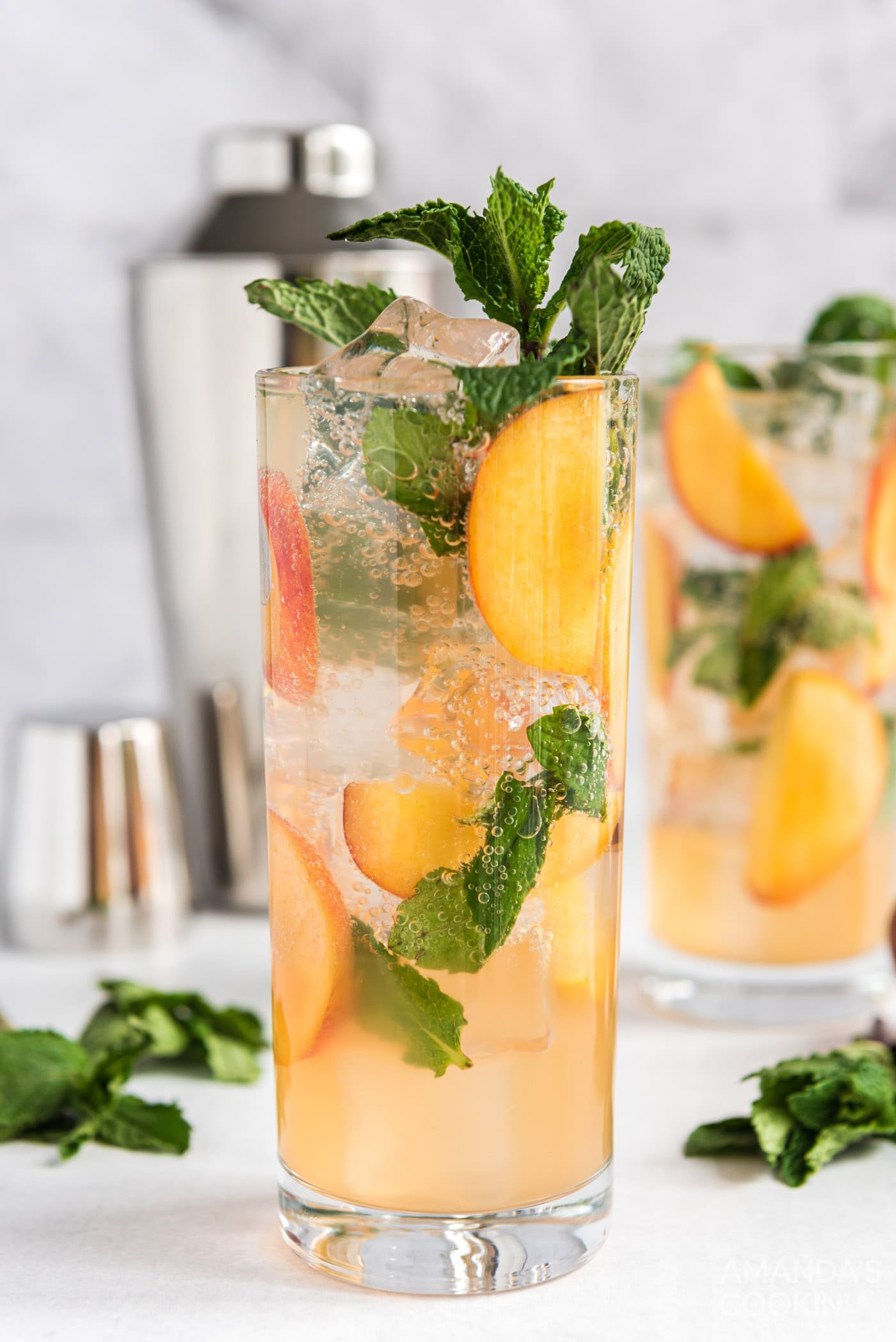 peach mojito in a tall glass
