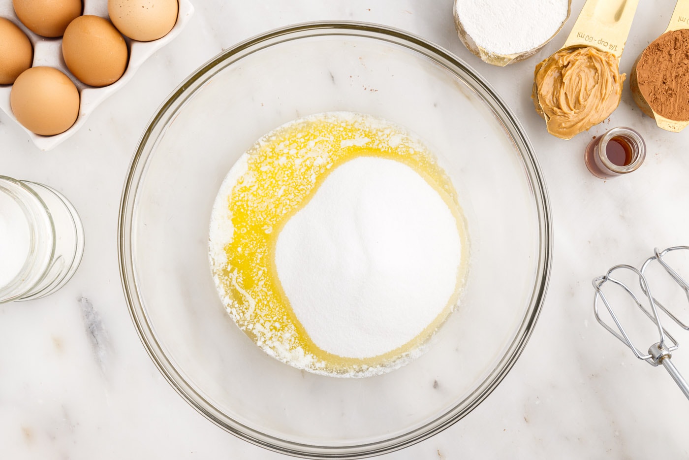 melted butter and sugar in a mixing bowl