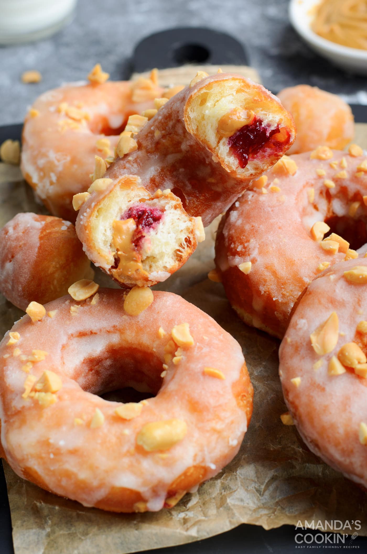 Peanut Butter & Jelly Donuts in half showing the inside