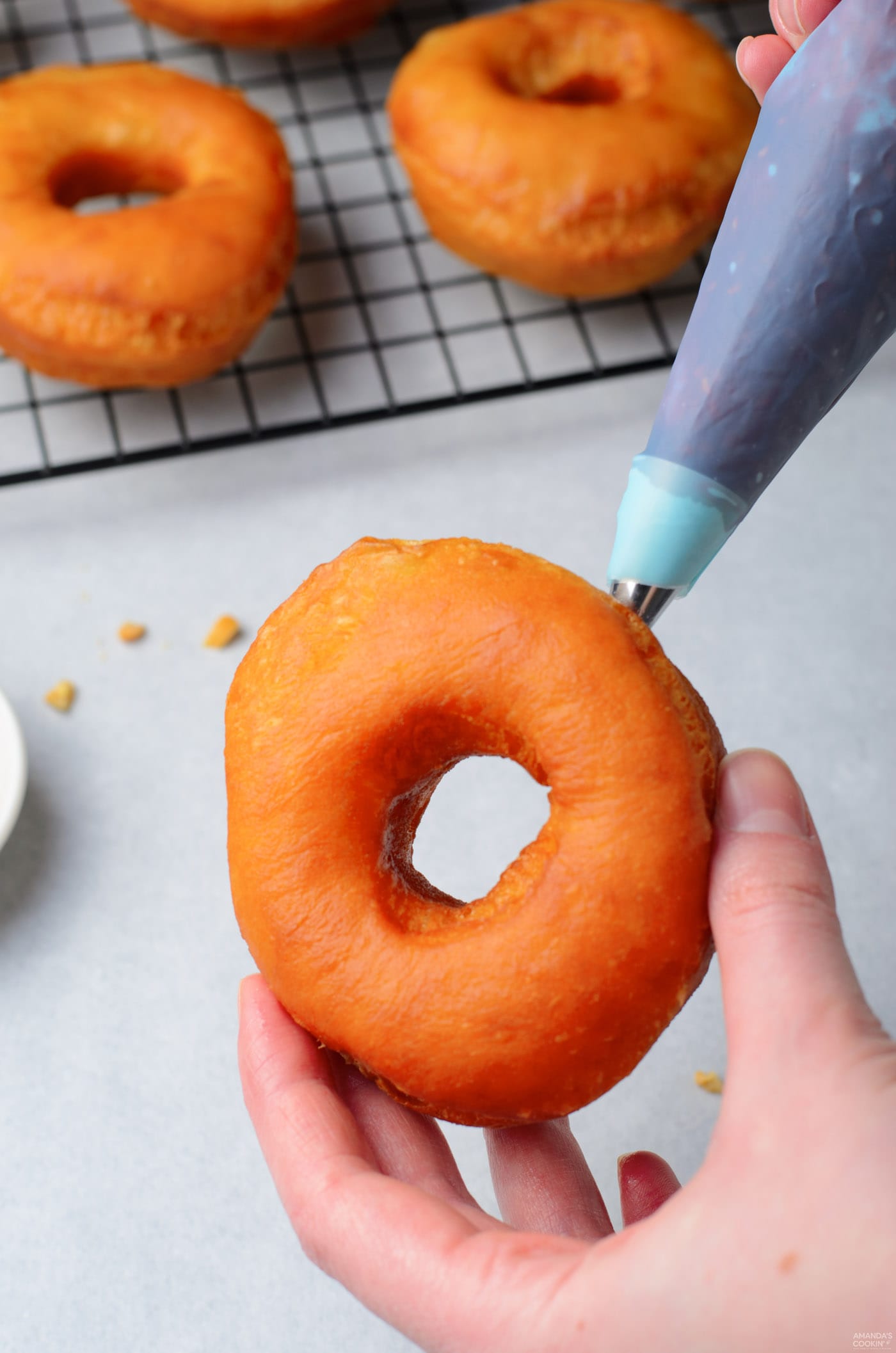 filling donuts with jelly