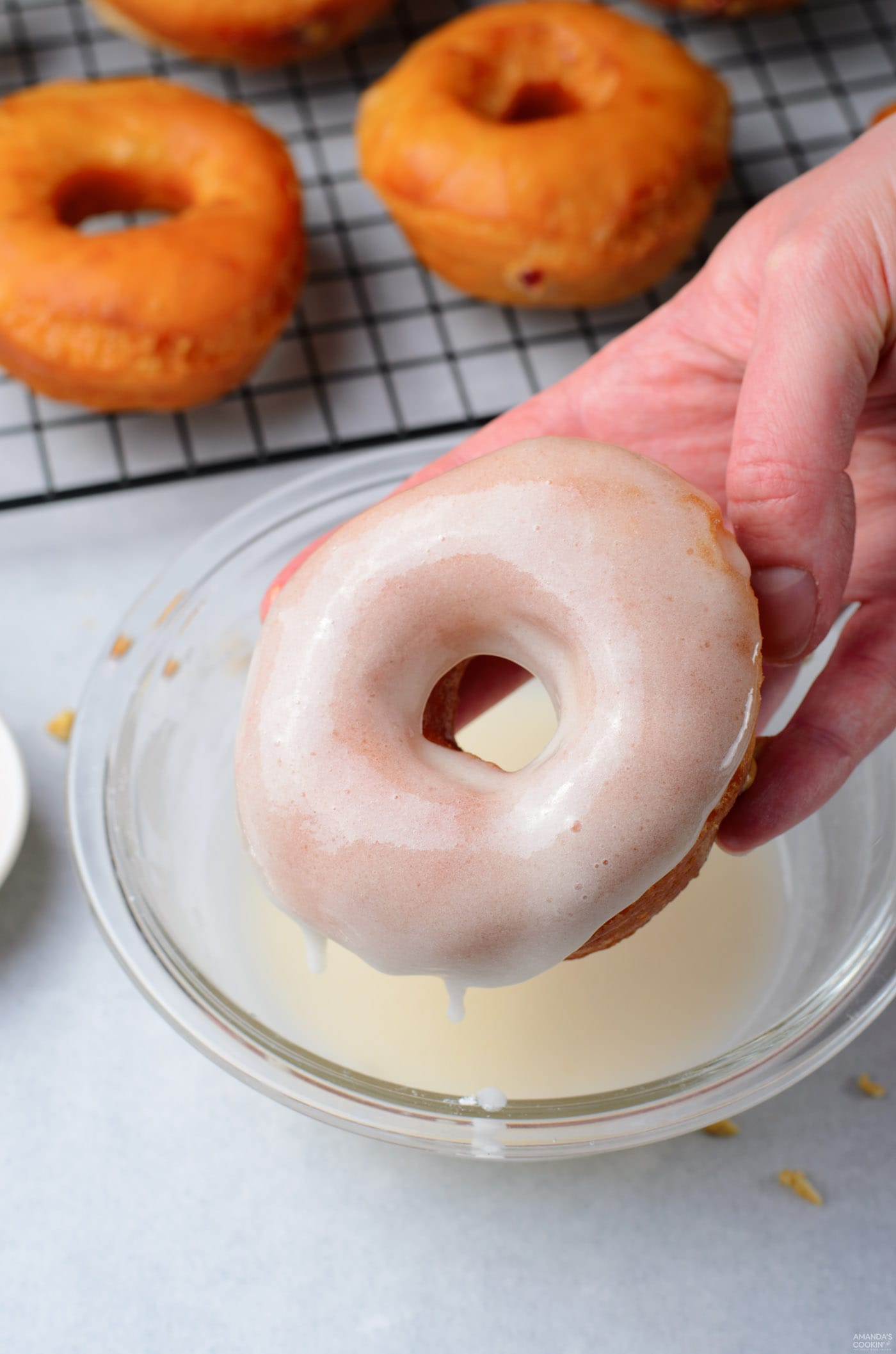 donut dipped in glaze