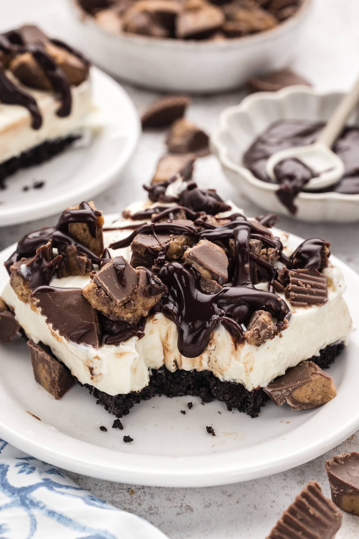 slice of Peanut Butter Oreo No Bake Cheesecake on plate